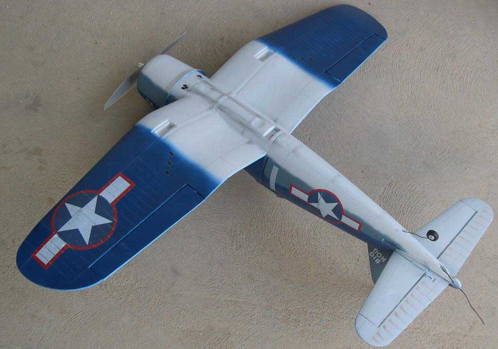 underside of Corsair; note panel lines and smoke stains