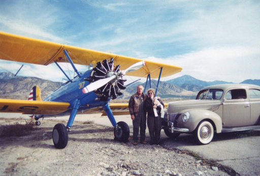 stearman pt-18 and 1940 Ford automobile stearman pt-18 and 1940 Ford automobile